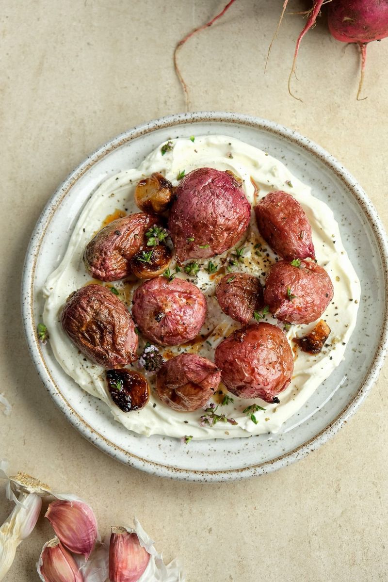 Roasted radish with lemon and garlic cream