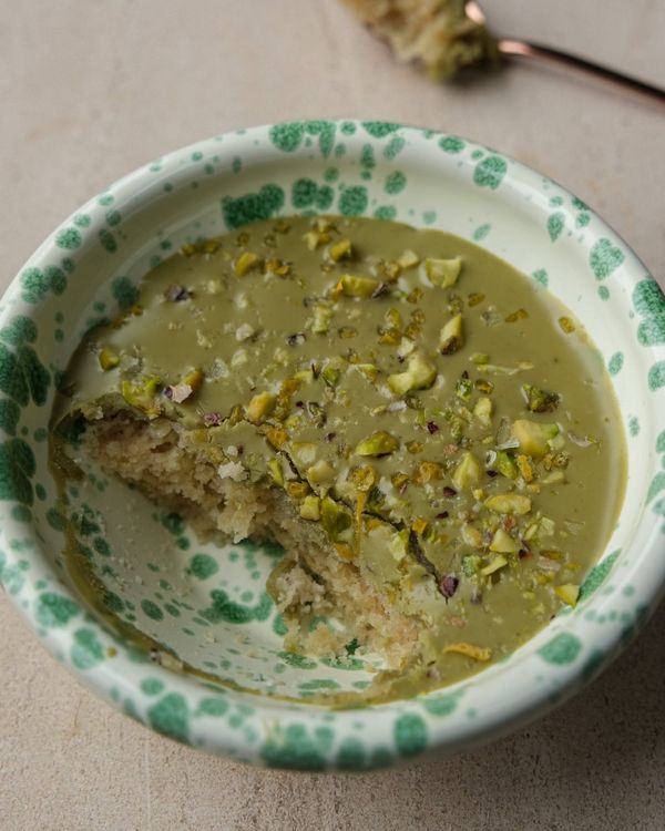Lemon and pistachio friand in a mug