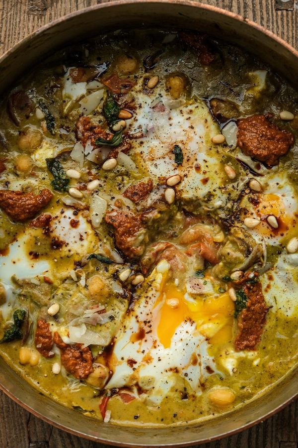 Baked eggs in pesto chickpeas
