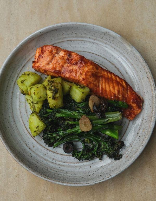 Salmon with pesto potatoes & pan fried tenderstem broccoli