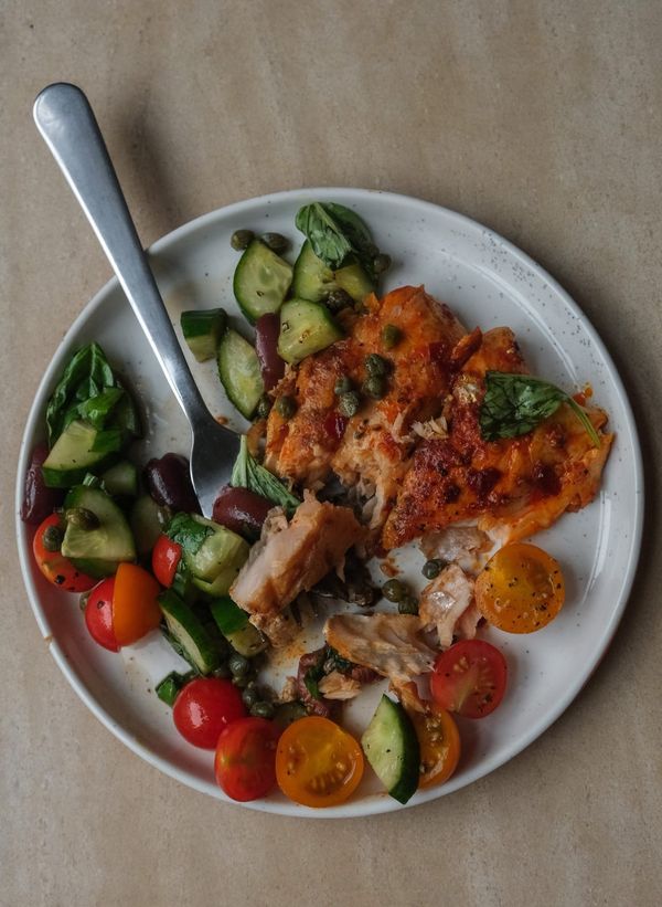 Salmon with harissa and tomato salad